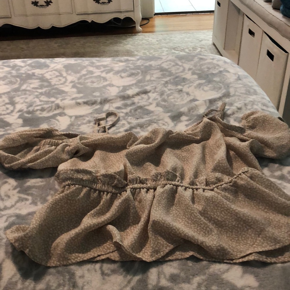 Iam selling a tan crop top blouse